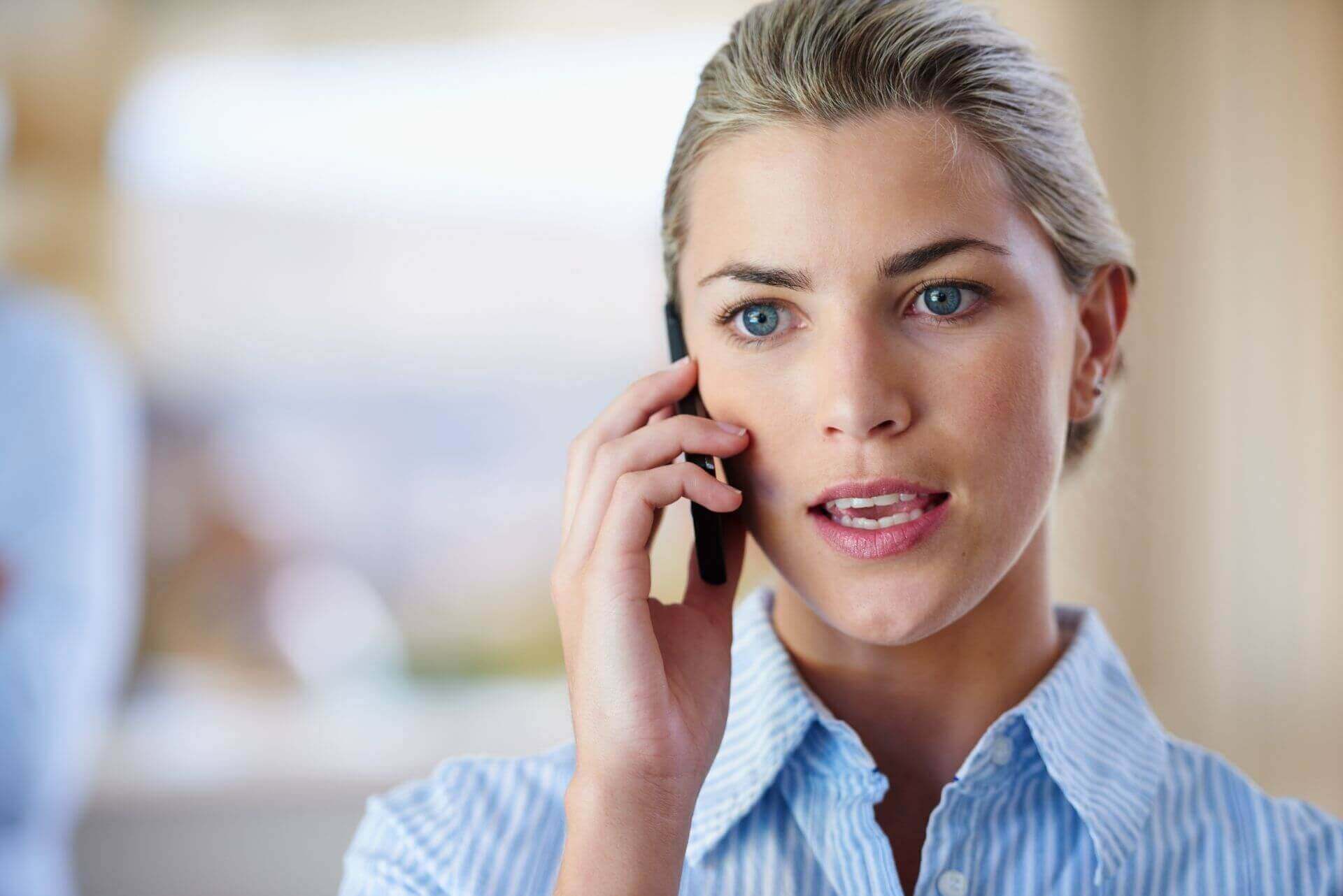 Woman calling a psychologist to book online appointment